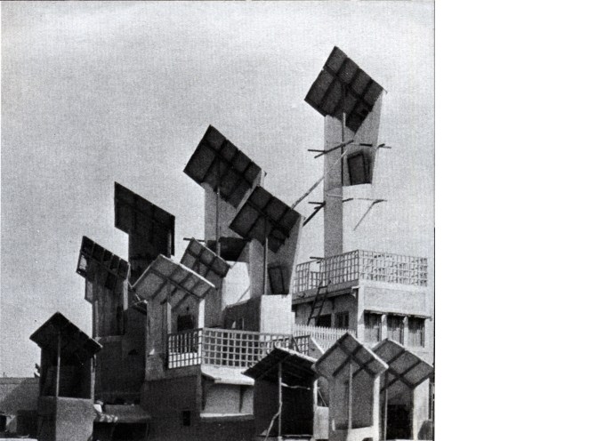 Hyderabad, Sindh, southern Pakistan; not Hyderabad, Andhra Pradesh, south India. Images from Bernard Rudofsky, Architecture without Architects, New York, Museum of Modern Art, 1964: windscoops (called bad-gir by Rudofsky, müg by Wikipedia) on the roofs of buildings, which channel air into their interiors. “In multistoried houses they reach all the way down, doubling as intramural telephones. Although the origin of this contraption is unknown, it has been in use for at least five hundred years.”